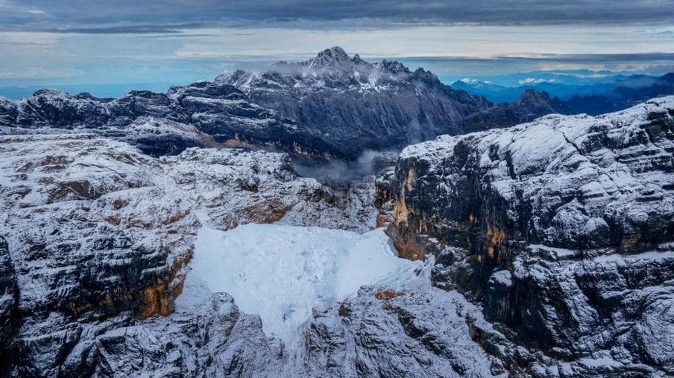 An aerial view of the Sudirman mountain range in Papua - a small patch of snow is visible on one of the mountains