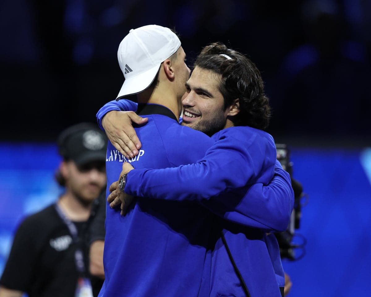 Carlos Alcaraz and Jakub Mensik embrace
