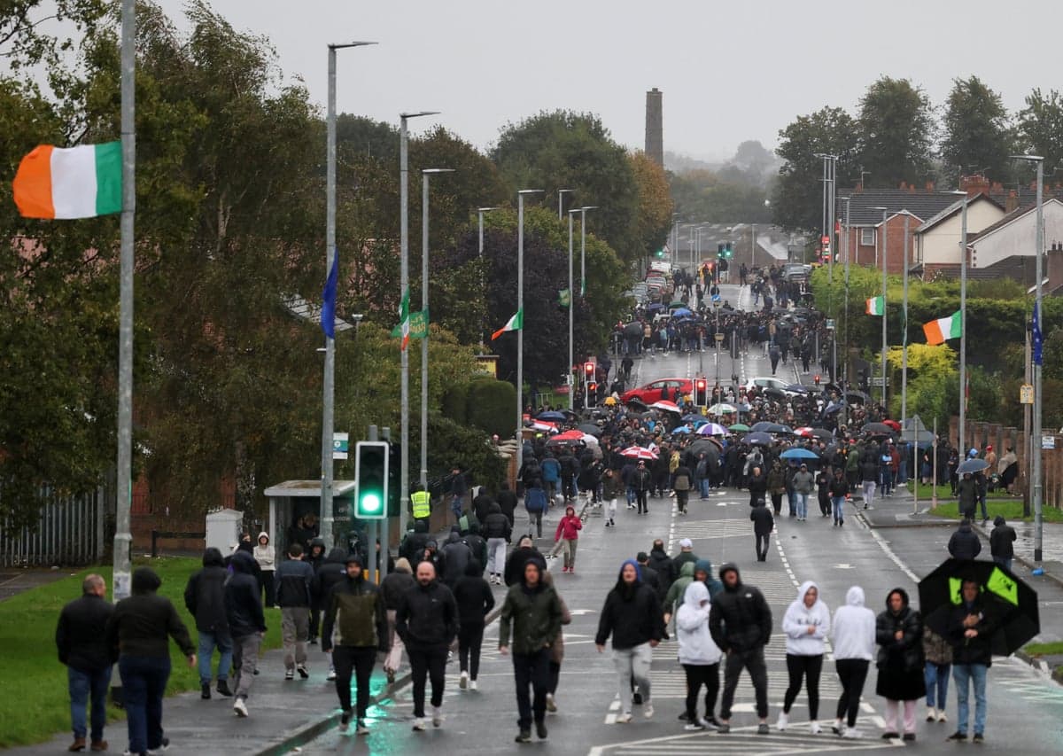 People block the Garvaghy road, a Catholic enclave in the largely Protestant town of Portadown, ahead of the Orange Order march