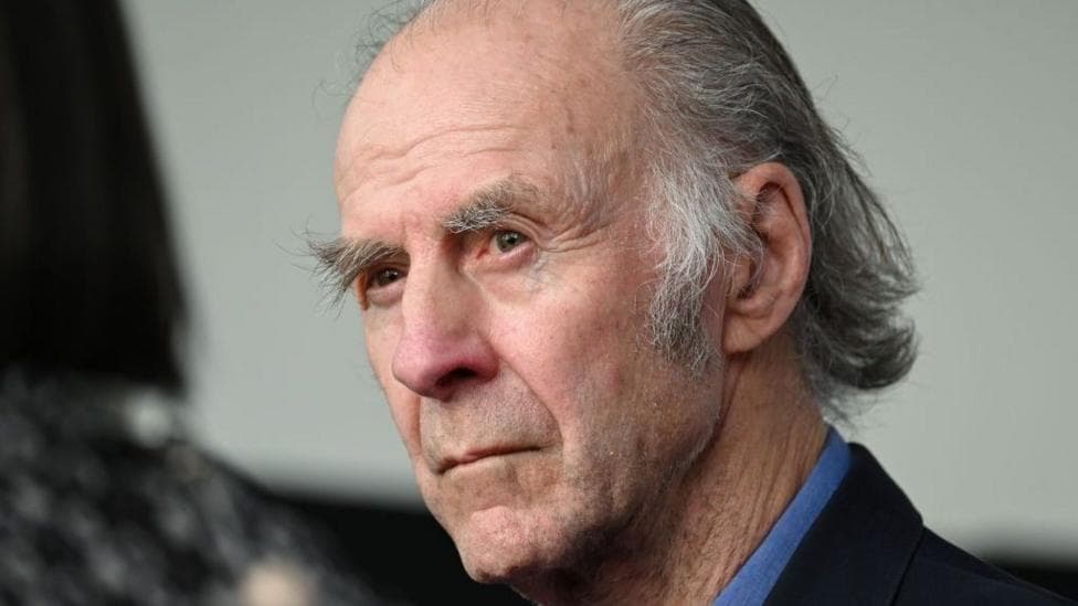 Sir Ranulph Fiennes in a blue shirt and blazer as he attends a premiere