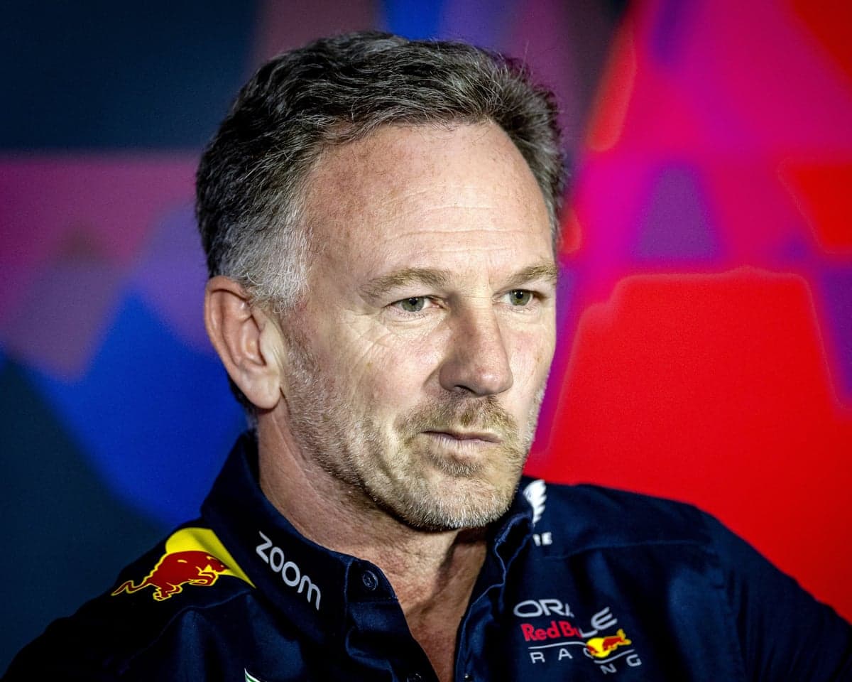 Christian Horner looks concerned during a Red Bull press conference