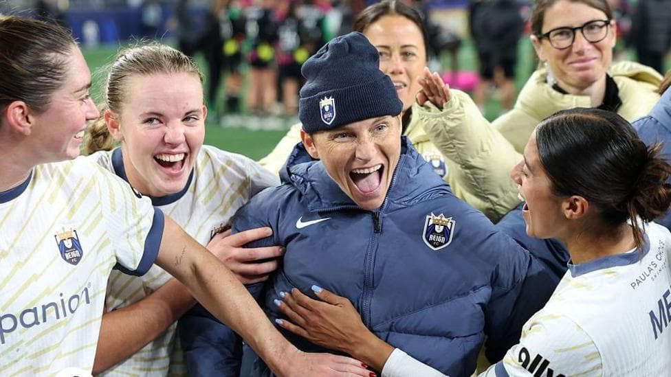 Jess Fishlock celebrates Seattle Reign's victory last weekend with team-mates