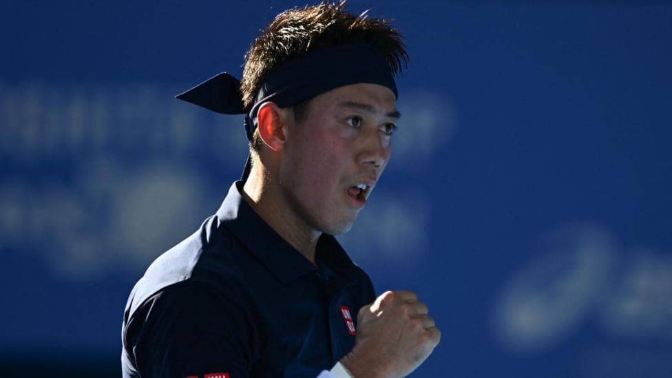 Kei Nishikori celebrates a point against Frances Tiafoe at the Japan Open