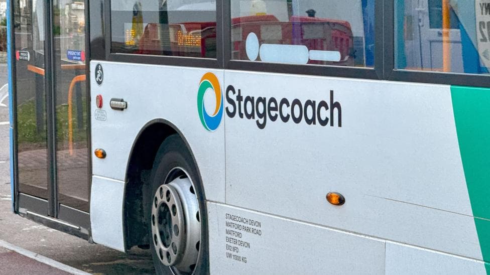 The close up of a Stagecoach bus. It is painted white and green with the name Stagecoach on the side.
