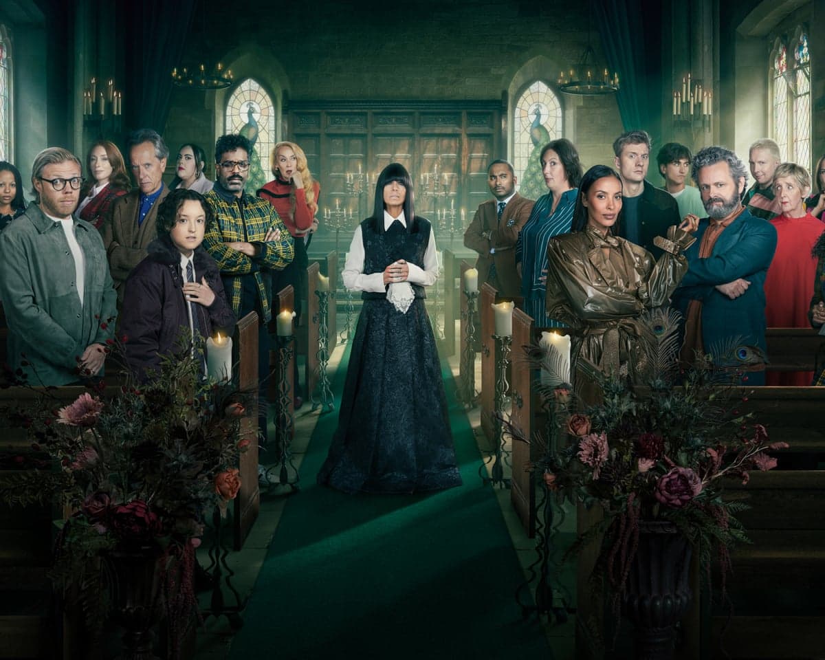 Claudia Winkleman stands in the aisle as Celebrity Traitors contestants watch from the pews