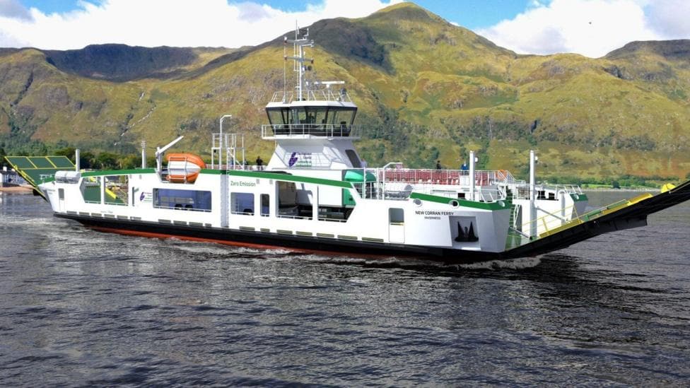 A white ferry sits on top of grey waters with a tall, green hill in the background.