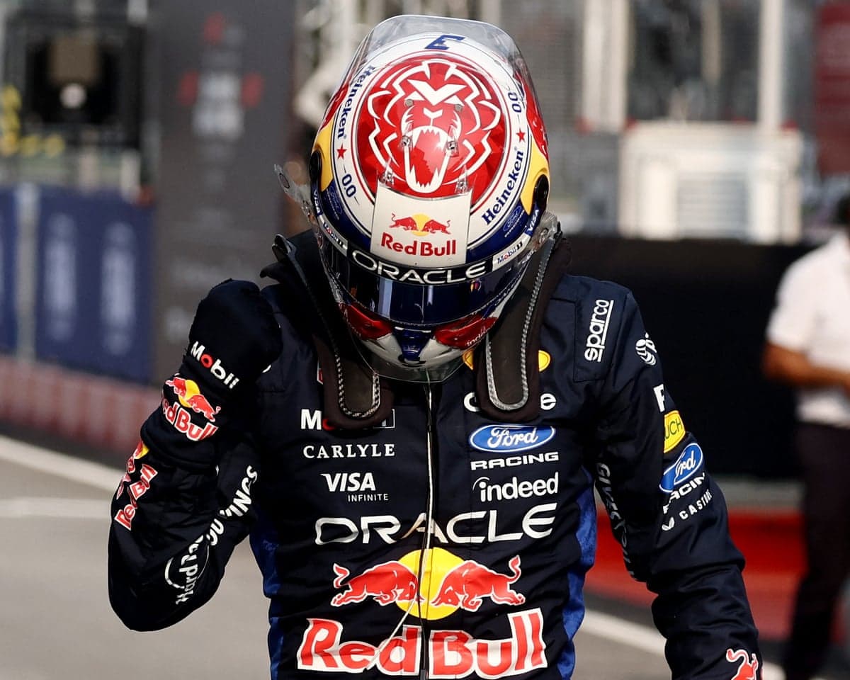 Red Bull's Max Verstappen raises a first in celebration