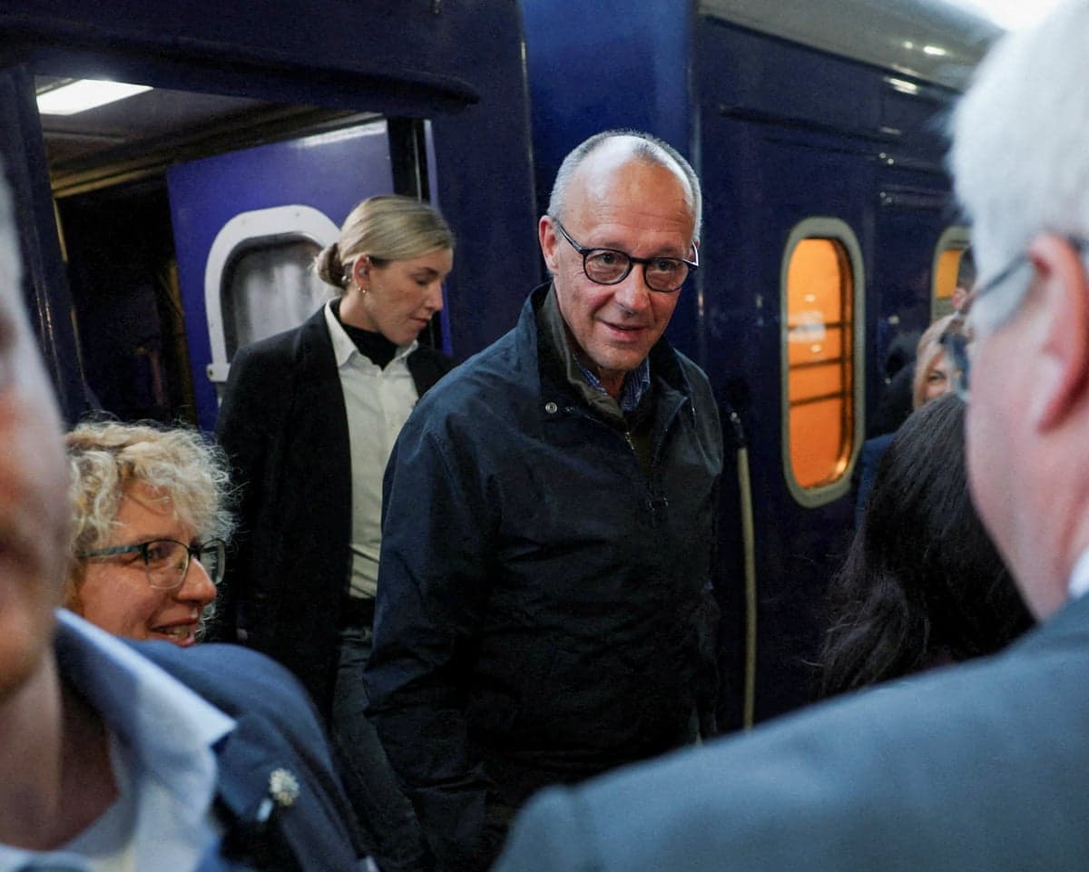 German chancellor Friedrich Merz arrives at a railway station in Kyiv on Sunday.
