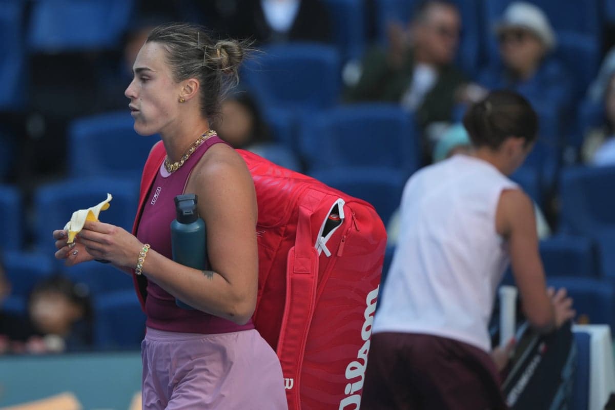 Aryna Sabalenka leaves the court after losing in straight sets to Nikola Bartunkova at the China Open in Beijing.