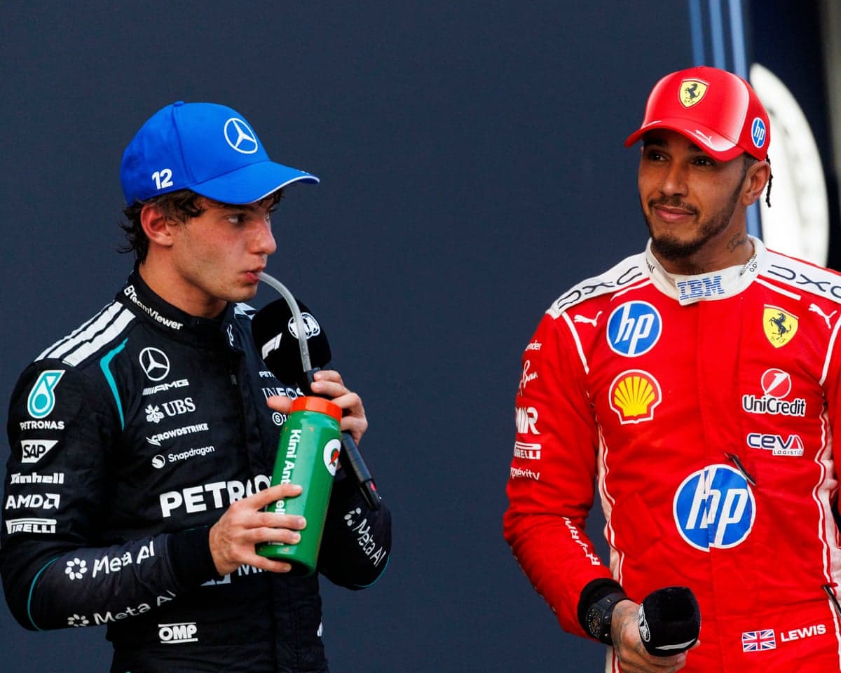 Kimi Antonelli (left) and Lewis Hamilton on the podium after the Bahrain Grand Prix.