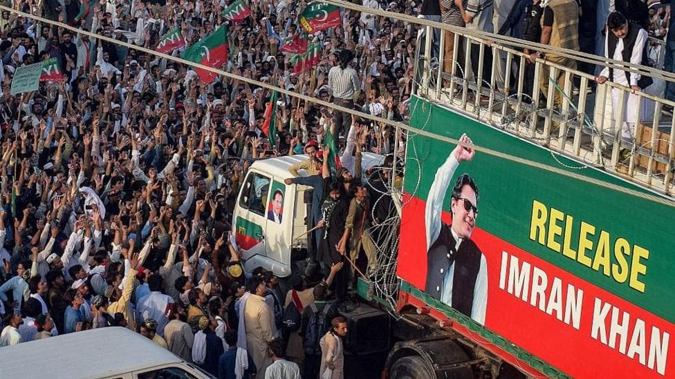 Some 5,000 people took to the streets on Sunday carrying red-and-green flags of Khan's Pakistan Tehreek-e-Insaf party
