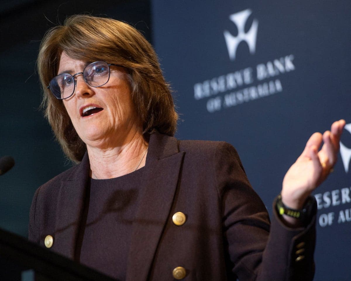 Michele Bullock, Reserve Bank of Australia Governor, gestures while speaking at a podium