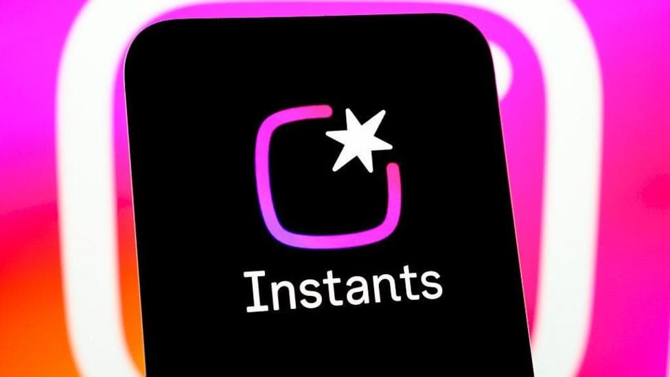 Instagram Instants logo shown on a smartphone screen, against a colourful backdrop of the Instagram logo.