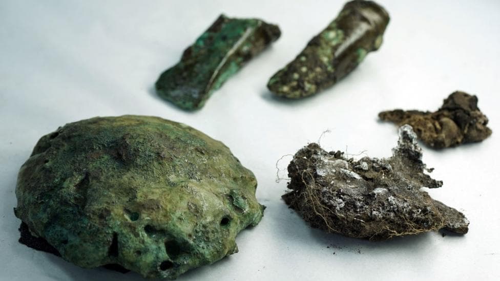 Bronze axeheads and a copper ingot