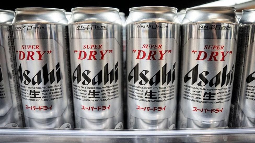 Asahi Super Dry beers are seen on display at a supermarket in Tokyo on October 3, 2025.