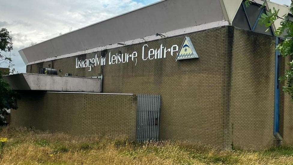 An exterior shot of Lisnagelvin Leisure Centre, which is in a state of disrepair