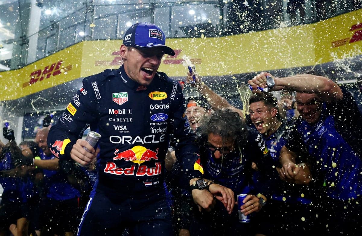 Max Verstappen and the Red Bull team principal, Laurent Mekies, are soaked with energy drink after victory at the Bahrian Grand Prix in Malaysia