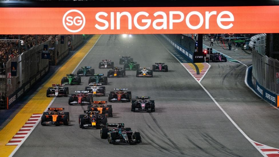 Thousands of fans watch the Formula 1 Singapore Grand Prix at the Marina Bay Street Circuit in Singapore on October 5, 2025.