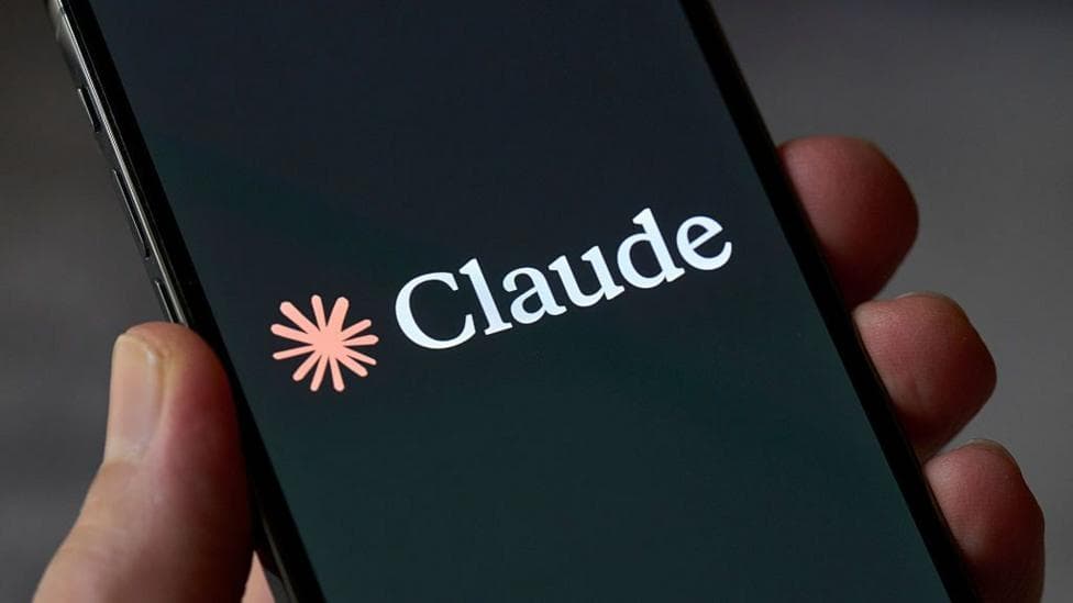 Claude logo on a phone screen. It looks like an orange splash.