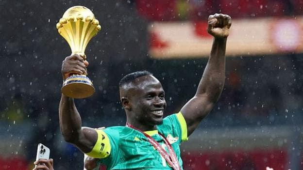 Sadio Mane lifts the Afcon trophy