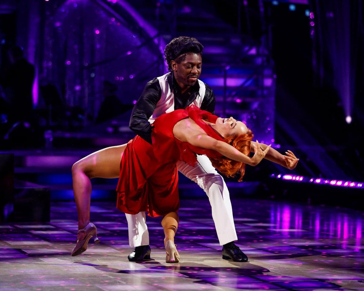 Shaun Wright-Phillips dips Alexis Warr backwards during a Strictly Come Dancing routine