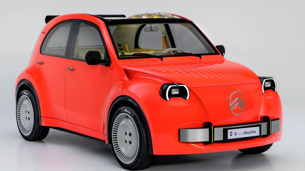 A red Citroen 2CV prototype, with retro styling