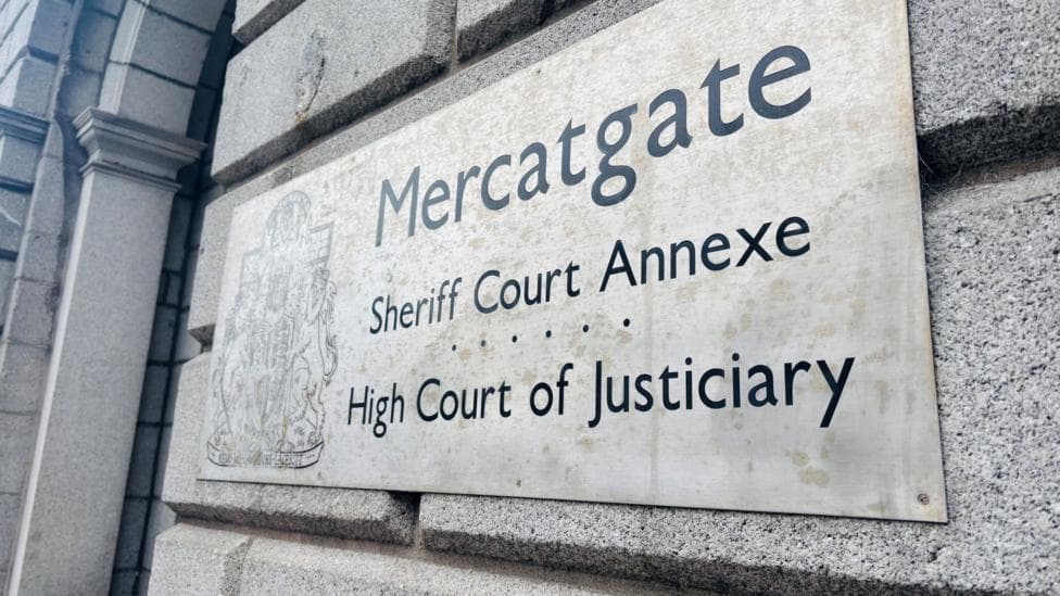 Sign outside court building which says sheriff court annexe.