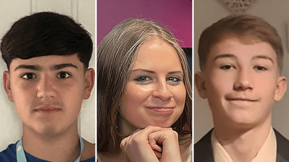 A composite image of the three teenagers. Luke Etheridge is on the left and is looking into the camera with a straight face. He has dark, short hair which is longer on the top compared to the sides. He is wearing a blue t-shirt and lighter blue lanyard. Zara Shaw is in the middle smiling into the camera with her chin resting on her clasped hands. She has long brown hair and is wearing a black vest with a pearl bracelet on her wrist. Jackson Duke is on the right and has light brown short hair. He is smiling to the side. He is wearing a black suit jacket and beige shirt and tie.