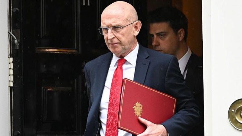 Chancellor John Healey walks out of a cabinet meeting at Number 10 Downing Street