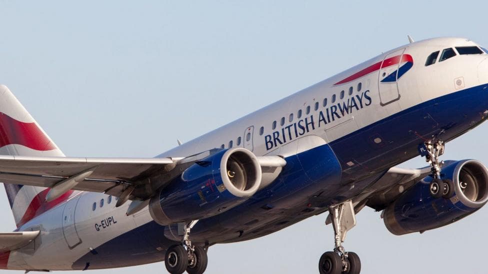 A British Airways plane taking off.