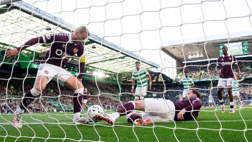 Hearts players try to prevent Celtic's fifth goal