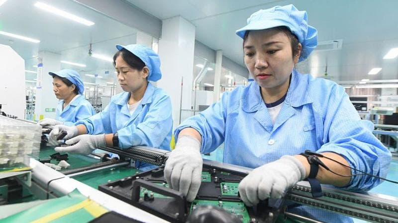 Workers produce export orders at the workshop of Dongfang Jiule Automotive Electronics (Shanghai) Co., Ltd. Xinle Branch on September 15, 2026 in Xinle, Hebei Province of China.