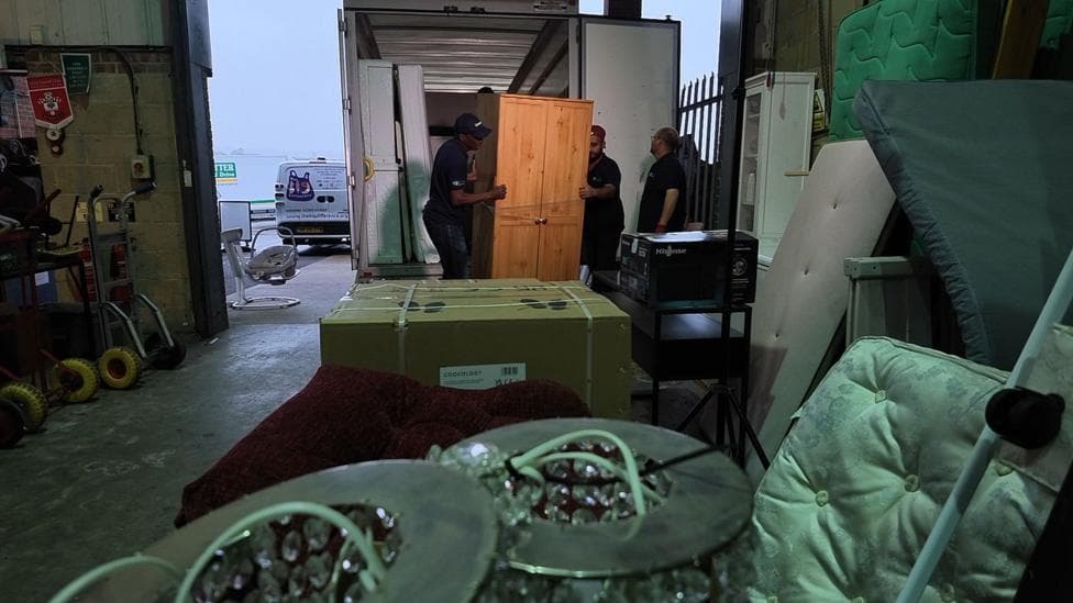Furniture being loaded into a lorry at the Scratch charity warehouse