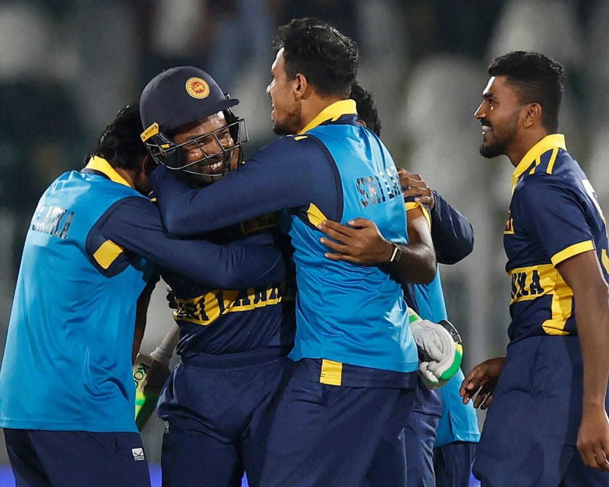 Sri Lanka's Janith Liyanage celebrates with teammates after his match-winning six