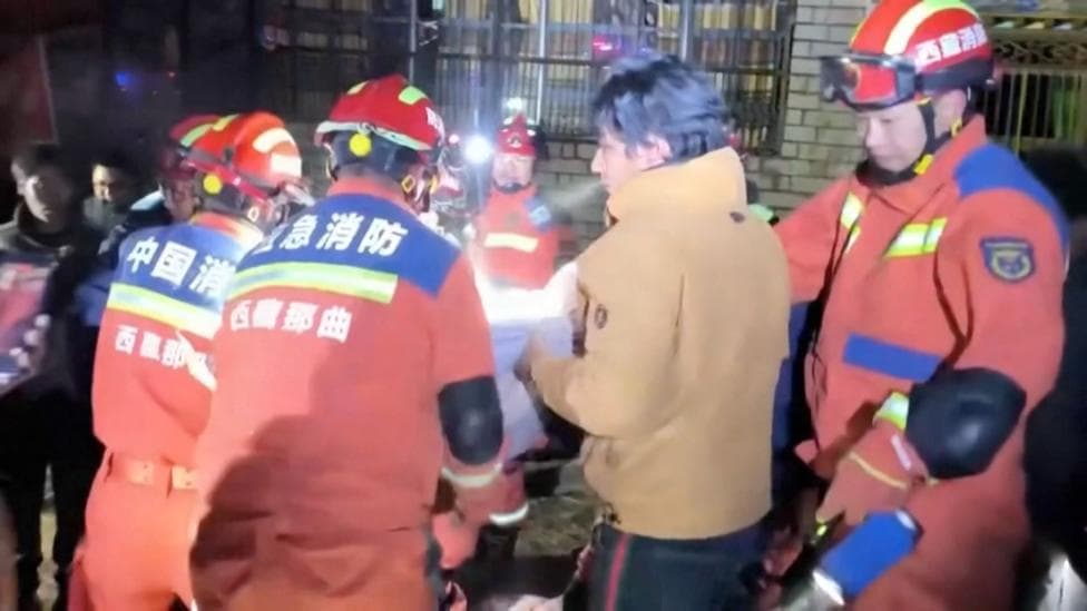 Firefighters and residents seen helping victims of the earthquake trapped under rubble.