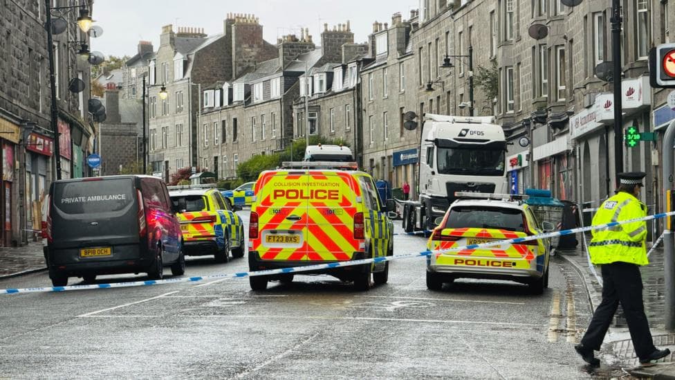 Emergency vehicles at the scene of a collision on an Aberdeen street.