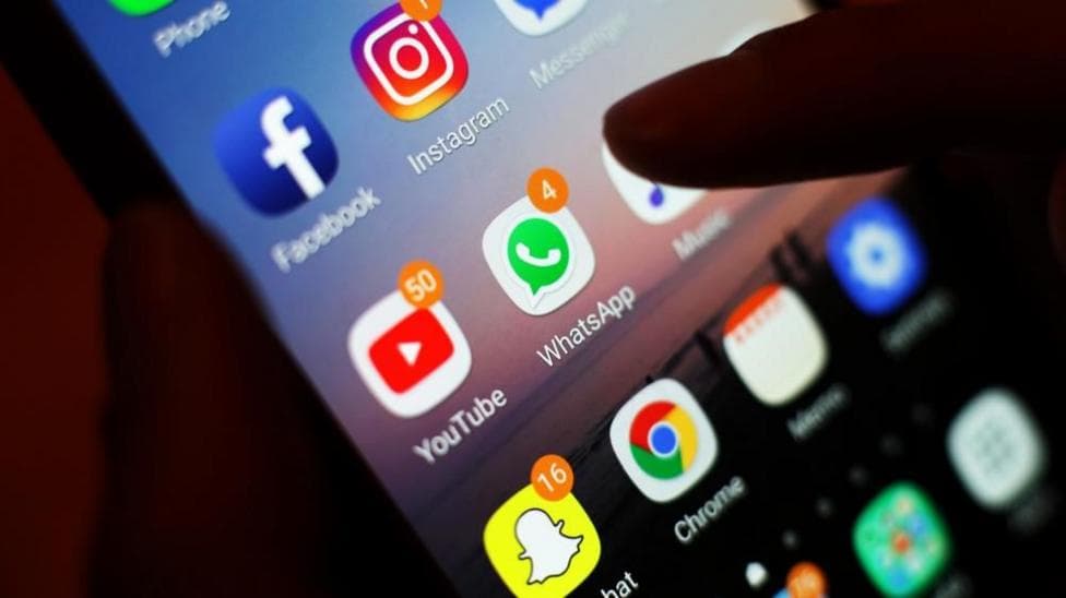 Icons of social media apps, including Facebook, Instagram, YouTube and WhatsApp, is displayed on a mobile phone screen. File photo