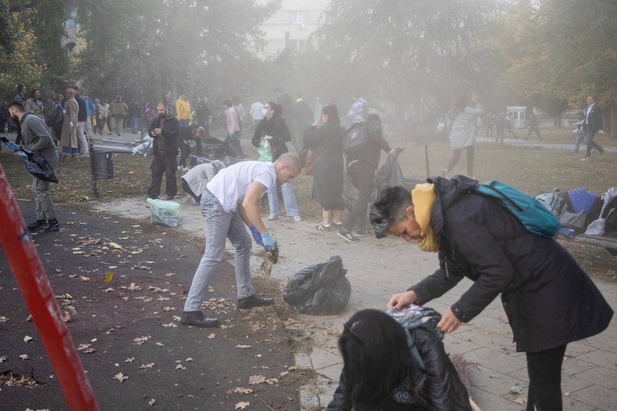 Volunteers armed with waste sacks clean up Pioneers Park