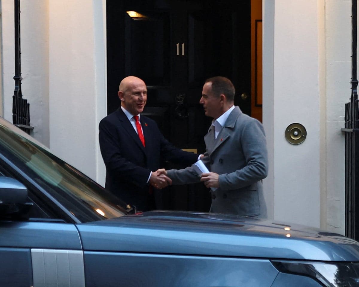 Chancellor John Healey with financial journalist Martin Lewis outside 11 Downing Street on the morning of the budget.