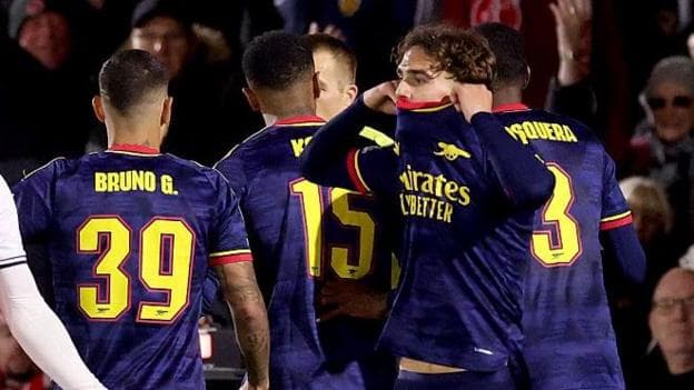 Arsenal's Max Dowman lifts his shirt over his mouth after being sent off against Fleetwood in the Carabao Cup