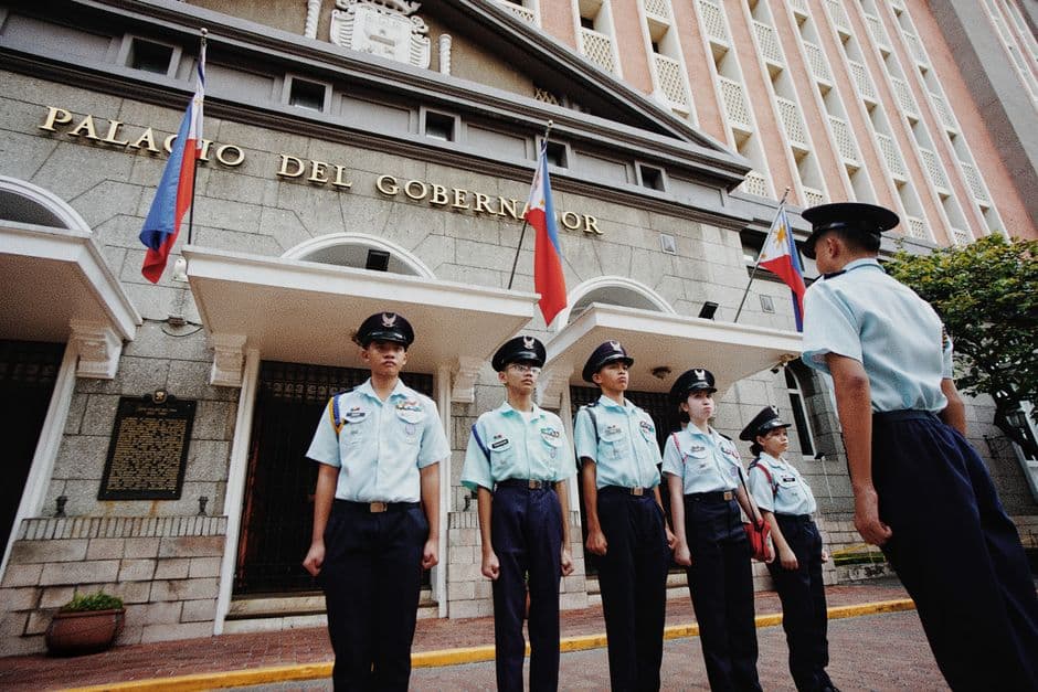 Cadets stand in formation outside the historic Palacio del Gobernador in Manila, Philippines.