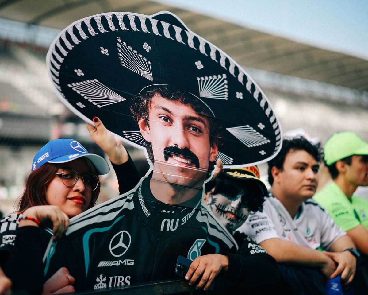 A fan with a cardboard cutout of Kimi Antonelli in the buildup to the Mexico Grand Prix