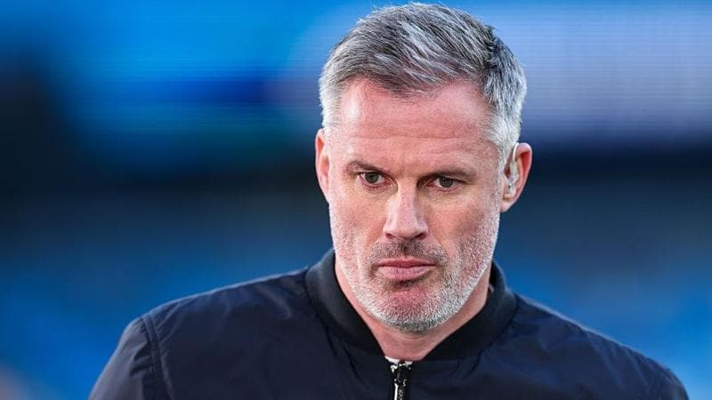 Jamie Carragher, frowning and wearing a dark jacket